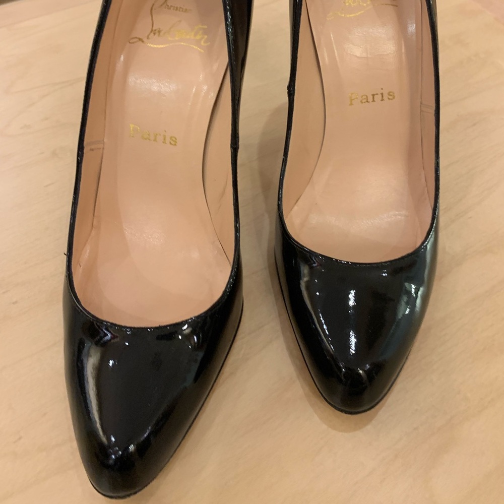 Christian Louboutin black patent leather pumps